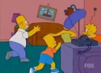 the simpsons are playing a game in the living room